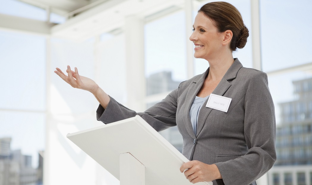 One businesswomen using a podium, up close