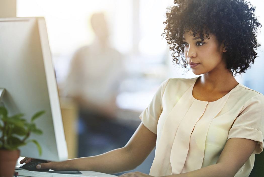 One businesswomen using a computer, up close